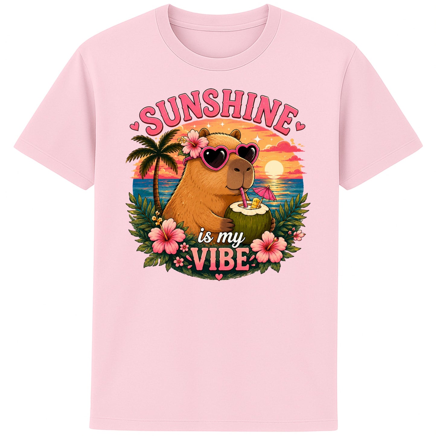 Pink Sunshine Is My Vibe Capybara T-Shirt featuring a cute capybara wearing heart-shaped sunglasses, holding a coconut drink with tropical flowers, palm trees and a colourful summer beach sunset graphic.