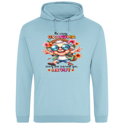 Ice blue funny grandma hoodie featuring a colourful cartoon grandma wearing sunglasses with the phrase "The Crazy Grandma Everyone Warned You About", perfect gift for grandma, grandmother birthday gift, Grandparents Day gift, and gift from grandkids.