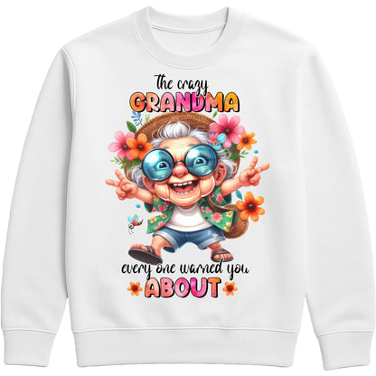 White funny grandma sweatshirt featuring a colourful cartoon grandma wearing sunglasses with the phrase "The Crazy Grandma Everyone Warned You About", perfect gift for grandma, grandmother birthday gift, Grandparents Day gift, and gift from grandkids.